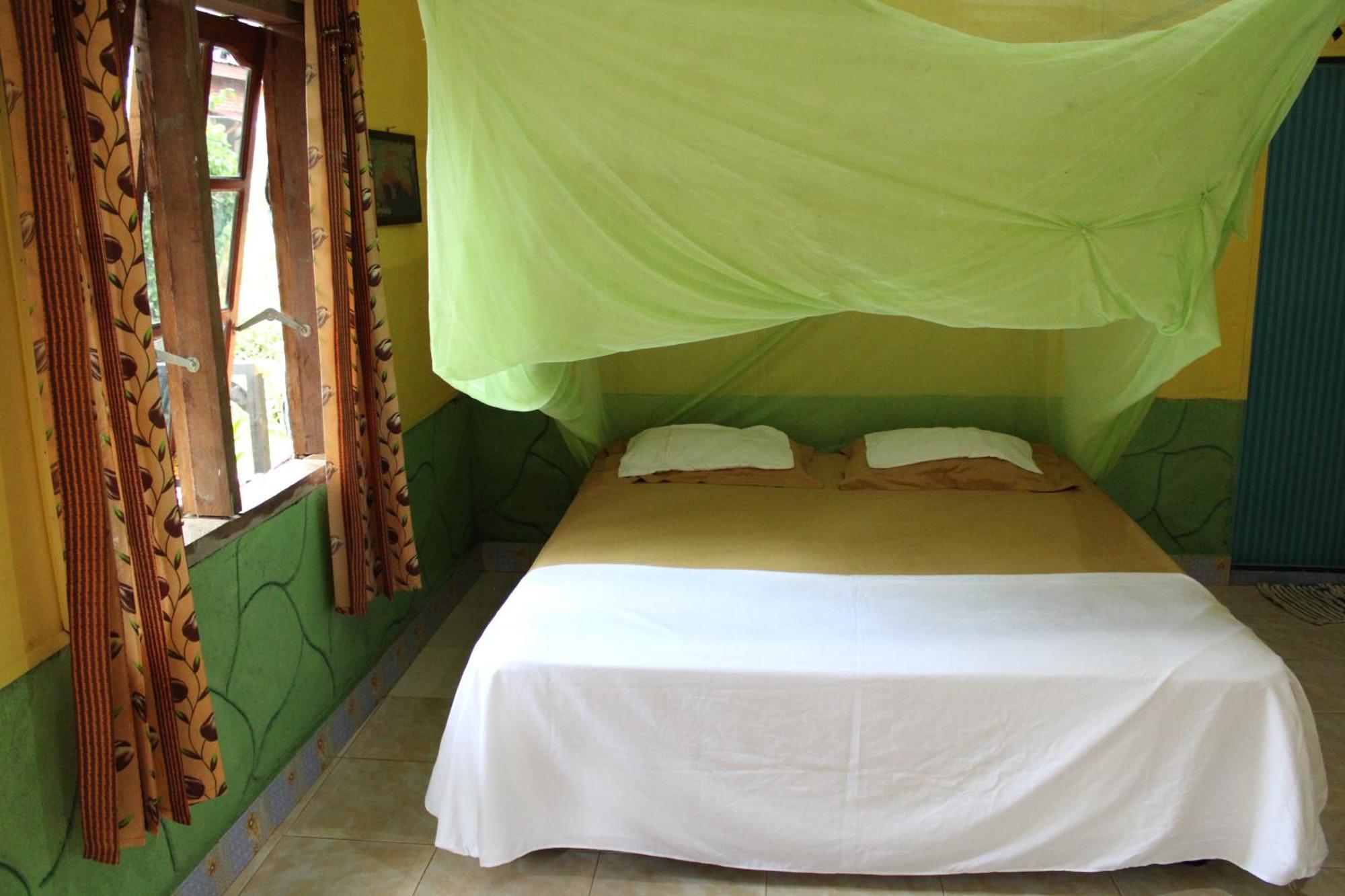 Mountain View Cottages & Villa Tangkahan Rum bild